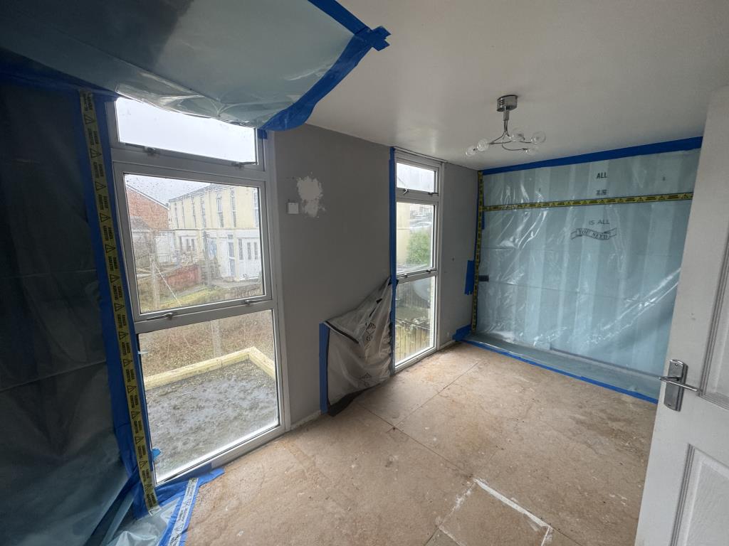 Lot: 162 - END-TERRACE HOUSE FOR IMPROVEMENT - View of bedroom one